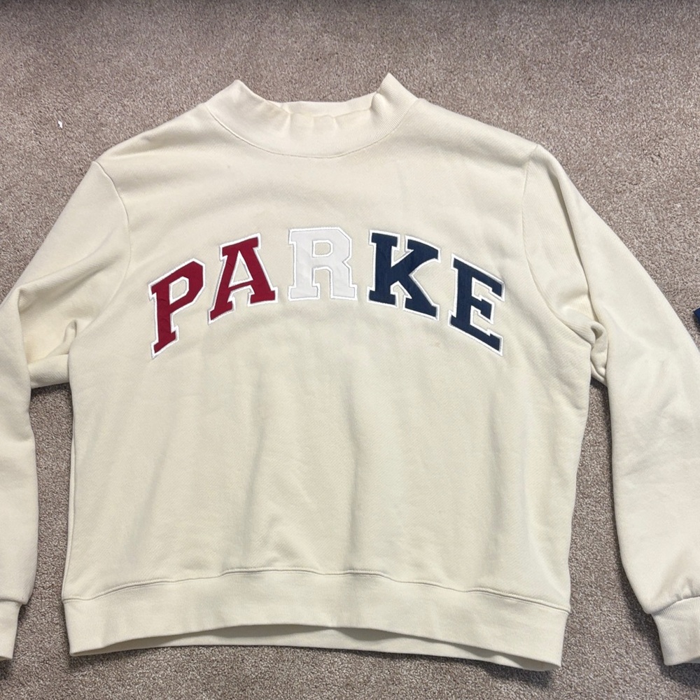 Parker Cream Sweater with Red, White, and Blue Lettering